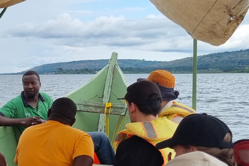 Why Travel East Africa with Ebonjalo Tours Travellers of Ebonjalo Tours on a boat tour in Jinja to visit the source of the nile while on an Uganda safari