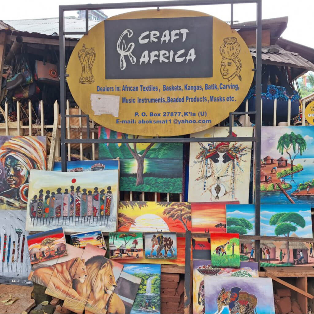 a signpost in Kampala about the crafts market