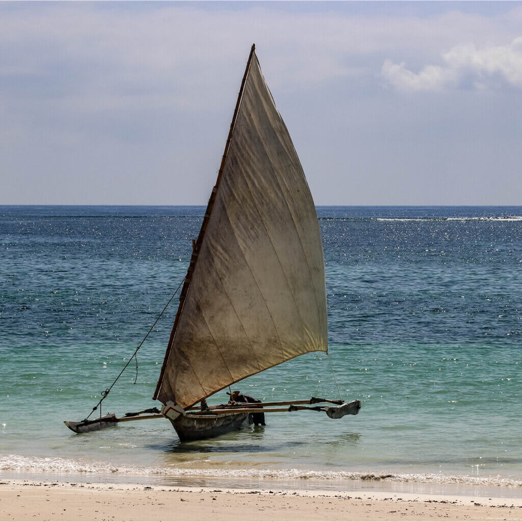 Uganda and Kenya Safari Destinations a dhow boat at Diani Beach in Kenya