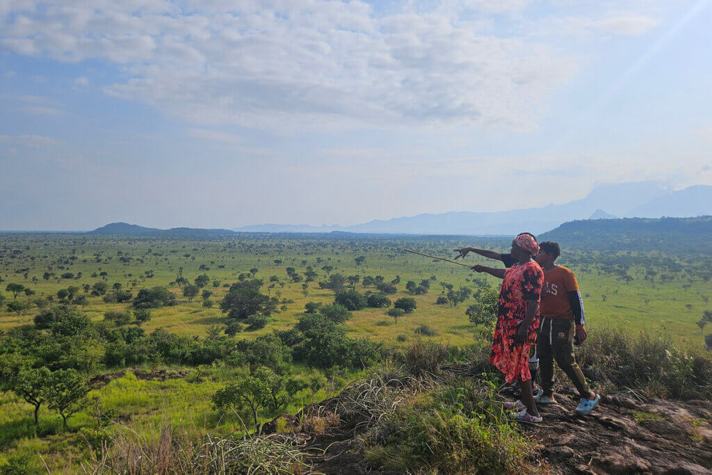 Ebonjalo Tours – East Africa Safari Tours Tourists visiting Pian Upe while on a East Africa Safari Tour with Ebonjalo where they climbed to the top of Napadet cave also called Elephant Rock