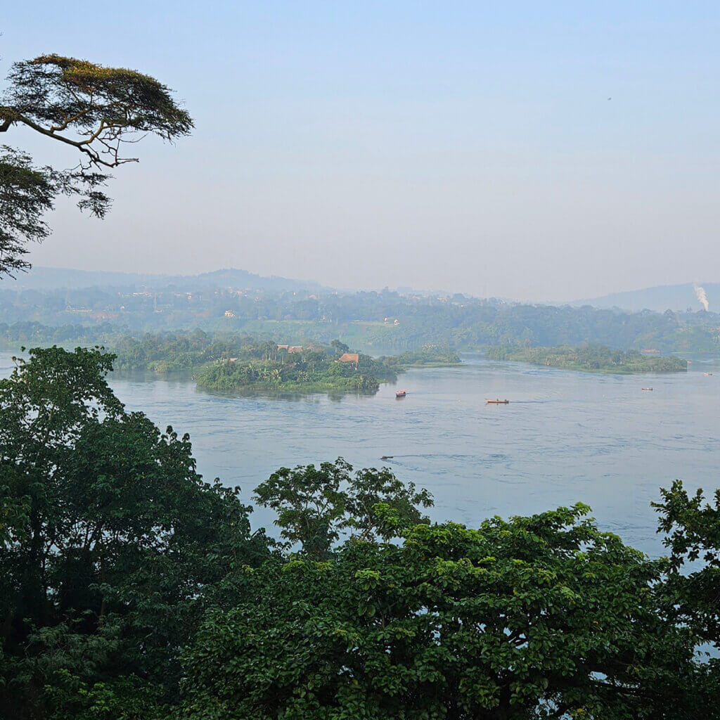 12 Day Kenya and Uganda Safari: Masai Mara & Karamoja The view over the river Nile in Jinja as seen from Nile Explorers Camp